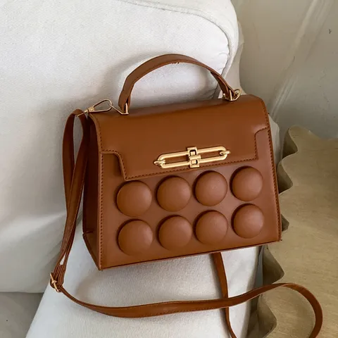Women's Top Handle Crossbody Bag PU Leather Fashion Retro Satchel Purse With Unique Round Relief Design And Metal Lock