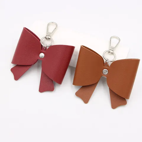 Vrouwen Eenvoudige Strik Kunstleer Sleutelhanger Tasbedel Hanger Met Metalen Sluiting Sleutelring Accessoires