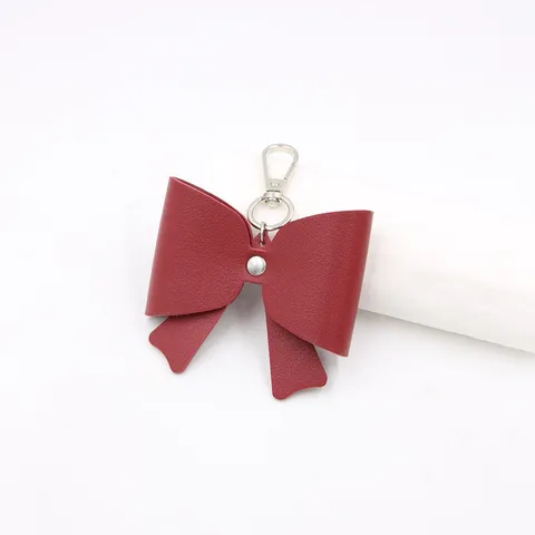 Vrouwen Eenvoudige Strik Kunstleer Sleutelhanger Tasbedel Hanger Met Metalen Sluiting Sleutelring Accessoires