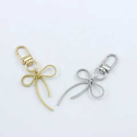 Korean Style Alloy Electroplated Ribbon Bowknot Keychain Pendant Delicate Rope Texture Lobster Clasp Bag Charm Phone Case Earphone Sleeve Decorative Accessories Gift