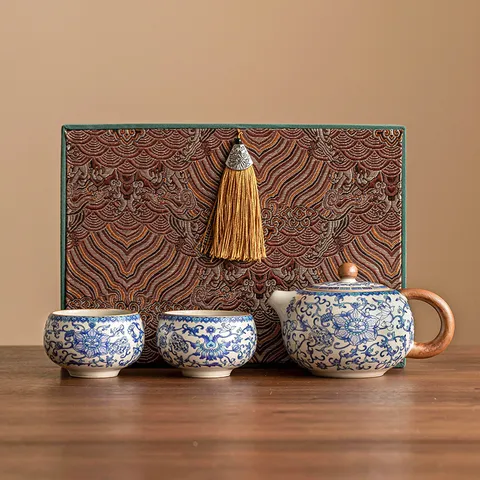 Ru Kiln Blue And White Lotus Xishi Teapot Tea Set Porcelain Gongfu Tea Set With Cups And Luxury Tassel Gift Box For Business Gifts