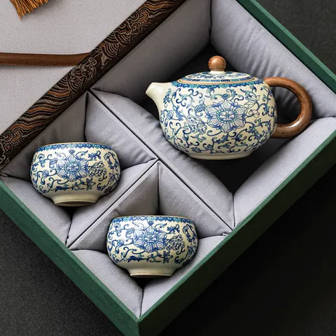 Ru Kiln Blue And White Lotus Xishi Teapot Tea Set Porcelain Gongfu Tea Set With Cups And Luxury Tassel Gift Box For Business Gifts