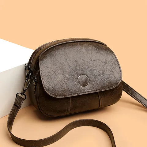 Sac Bandoulière pour Femmes en Cuir PU Design Niche Mode Mini Sac Rond Casual Chic Sac à Main Sac d'Épaule Portefeuille Quotidien