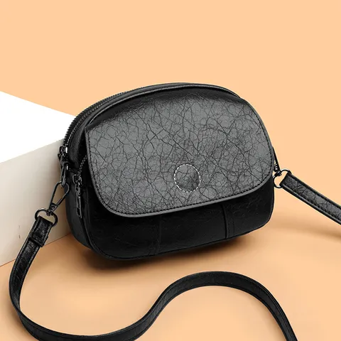 Sac Bandoulière pour Femmes en Cuir PU Design Niche Mode Mini Sac Rond Casual Chic Sac à Main Sac d'Épaule Portefeuille Quotidien