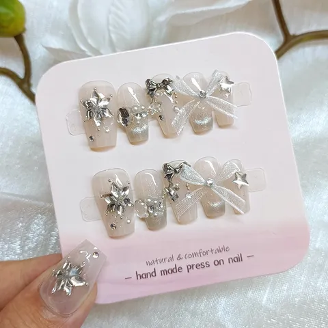 Uñas Postizas a Presión de Ojo de Gato Hechas a Mano 10 Piezas Copo de Nieve Strass Set Con Lazo Estilo Dulce Uñas de Gel Mujer