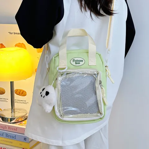 Bolso Ita de Estilo Japonés para Mujer Bolso Bandolera con Bolsillo de Red Transparente y Lindo Colgante de Nailon