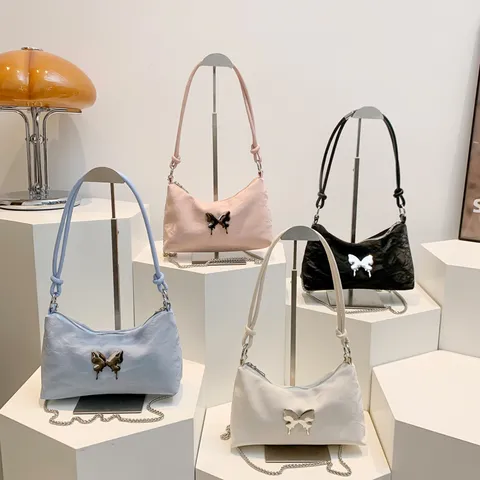 Femme Mode PU Cuir Sac Epaule Sous Bras Vintage Couleur Unie Sac Main Decontracte Avec Decor Metal Papillon