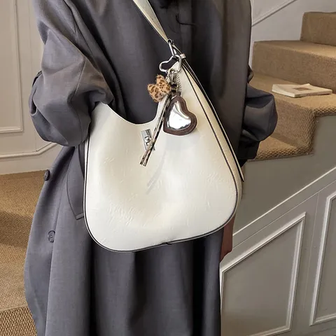 Sac Bandoulière Hobo en Cuir PU pour Femmes Sac Seau Rétro Élégant Sac Bandoulière de Commutateur Avec Pendentif Serrure Métallique
