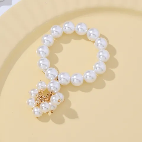 Ronds de Serviette en Alliage de Luxe Européen Avec Élégant Pendentif Gland en Perles Artificielles Blanches pour Décorations de Table