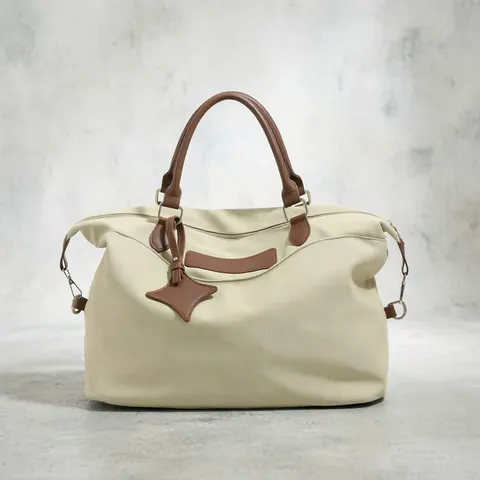 Large Capacity Canvas Travel Bag Featuring Stylish Colorblock Design And Dual Handles