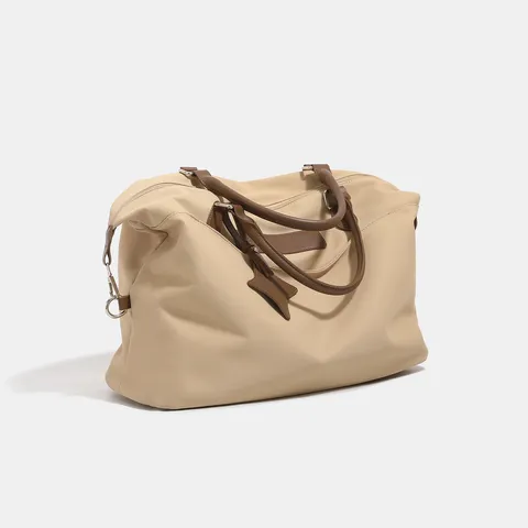 Large Capacity Canvas Travel Bag Featuring Stylish Colorblock Design And Dual Handles