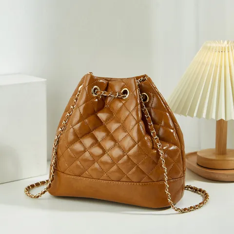 Women's Minimalist PU Leather Quilted Bucket Bag Chain Single Shoulder Commuting Handbag Fashion Luxury Style