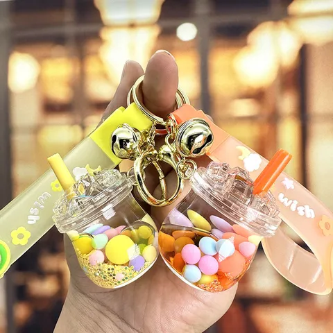 Portachiavi Creativo a Tazza di Tè al Latte con Sabbia Mobile Liquida Simpatico Ciondolo Borsa con Perline Colorate per Coppie