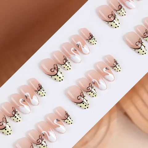 Unghie Finte Almond Rosa Nude Francese Con Design a Cigno Fiocco e Pois Stile Delicato Unghie Artificiali Donna