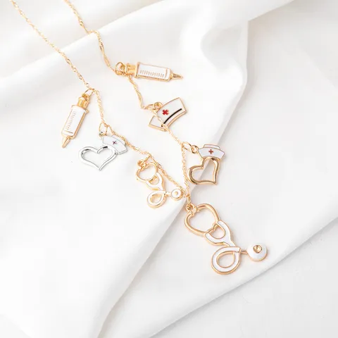 Minimalist Alloy Medical Theme Enamel Pendant Necklace Stethoscope Syringe Heart Nurse Cap Shape Gold Plated Layered Charm Necklace For Nurse Doctor Gift Women Jewelry