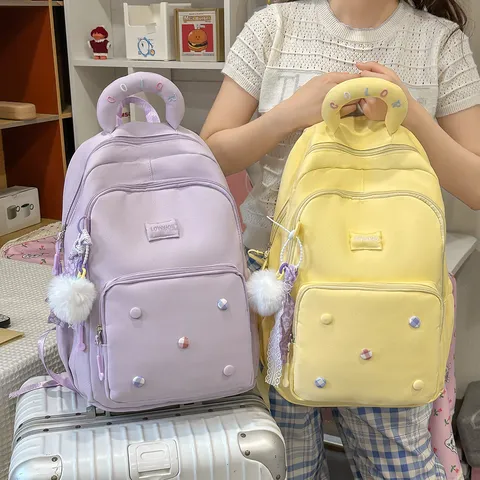 Schattige Meisjes Rugzak Grote Capaciteit Waterdicht Nylon Schooltas Voor Studenten Campus Reizen Rugzak Met Pompon Hanger