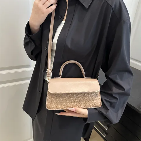 Minimalistische PU-Leer Geweven Geprofileerde Schoudertas Dames Vintage Klep Crossbody Handtas Casual Effen Kleur Tas