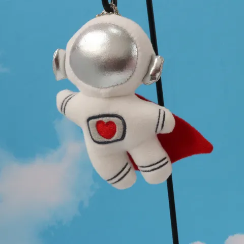 Weltraum Astronaut Plüsch Schlüsselanhänger Spaceman Anhänger Puppe Mit Rotem Umhang Reflektierendem Helm Herz Stickerei Rucksack Ornamente