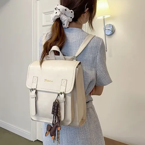 Women PU Leather Casual Backpack Large Capacity Travel School Bookbag Vintage Solid Color Schoolbag With Cute Pendant