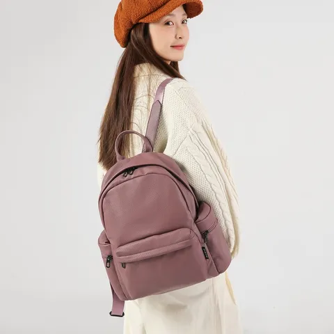 Women's PU Leather Casual Backpack Large Capacity Travel School Bookbag Minimalist Daypack with Pom Pom Pendant