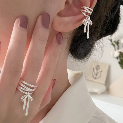 Silberbeschichtetes Kupfer Ballet Schleife Quaste Offener Ring Ohrklemme Minimalistischer Kreuzlinien Modeschmuck Geschenk