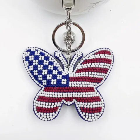 Handgefertigter 2mm Glas Perlen Schlüsselanhänger Amerikanische Flagge Texas Schmetterling Taschenanhänger Quaste Patriotisches Geschenk Damen
