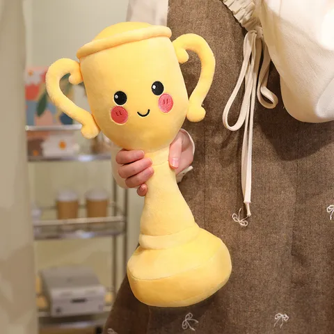 Goldenes Trophäen Plüschtier Süße Kuschelpuppe Weiches Kissen Abschlussgeschenk Kreatives Cartoon Kissen für Schüler