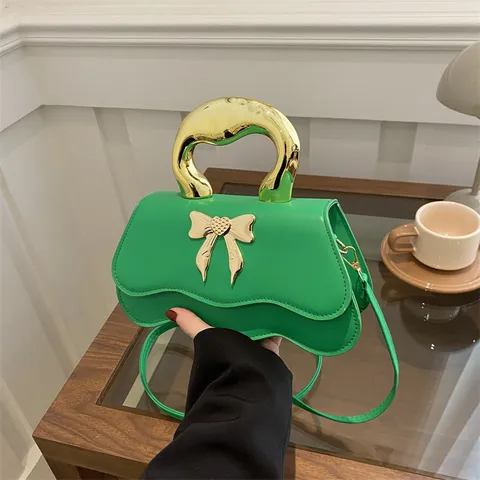 Damen Mode PU Leder Umhängetasche Süße Schleife Wellenboden Henkeltasche Lässige Tägliche Handtasche