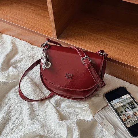 Women Small Saddle Bag PU Leather Vintage Crossbody Bag Ins Style Shoulder Bag With Metal Pendant Minimalist Handbag