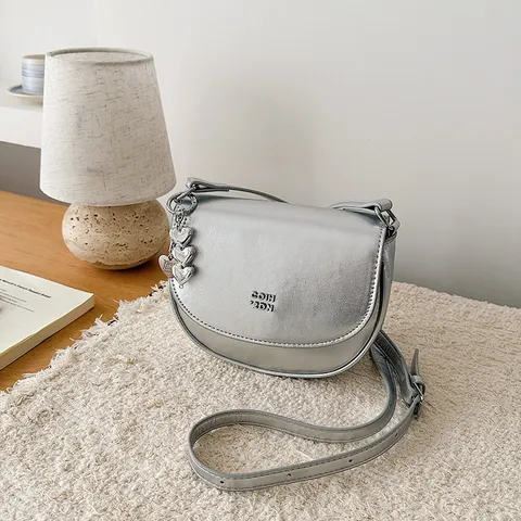 Women Small Saddle Bag PU Leather Vintage Crossbody Bag Ins Style Shoulder Bag With Metal Pendant Minimalist Handbag