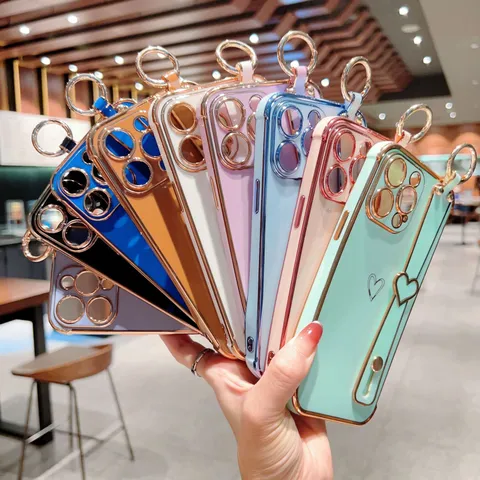 Electroplated Hollow Heart Silicone Phone Case With Wristband Stand Drop-Proof Protective Cover For Smartphone