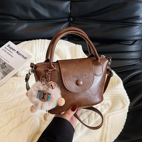 Retro PU Leather Handbag For Women Vintage Casual Crossbody Bag Stylish Top Handle Bag With Cute Plush Pendant