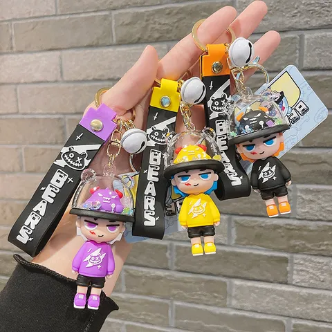 Trendy Quirky Monster PVC Figurine Keychain With Liquid Quicksand Helmet Letters Printed Webbing Lanyard Bell Creative Cartoon Toy Car Backpack Pendant Charm Ornament For Teens