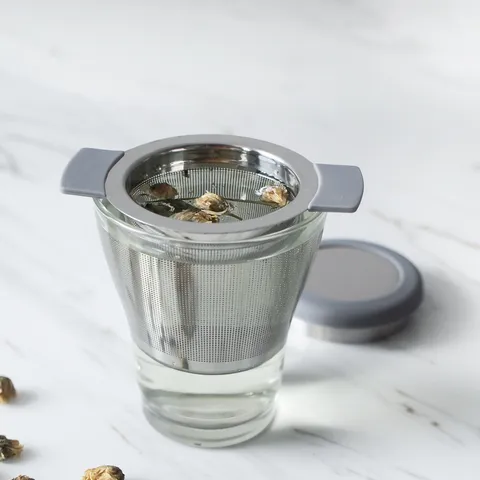Infuseur à Thé Filtre en Acier Inoxydable 304 Créatif Avec Poignée en Silicone et Couvercle pour Théière Maison