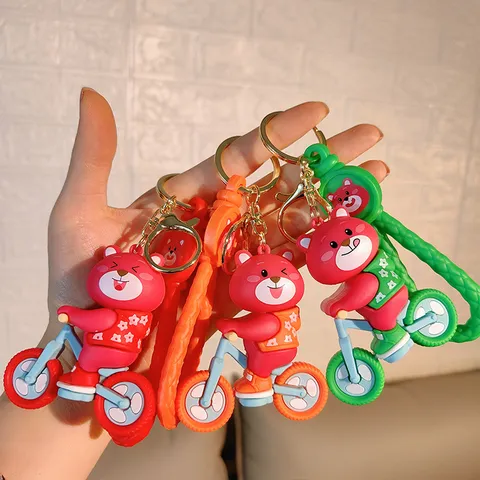 Schattige Cartoon PVC Beer Rijden Fiets Sleutelhanger Kleurrijke Anime Figuur Sleutelring Gevlochten Riem Auto Tas Hanger