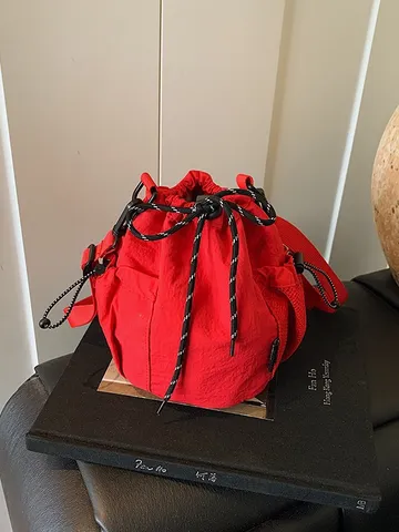 Japanese Style Niche Design Drawstring Bucket Crossbody Bag Lightweight Nylon Outdoor Sports Casual Shoulder Bag With Mesh Pockets For Everyday Wear Unisex
