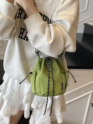 Japanese Style Niche Design Drawstring Bucket Crossbody Bag Lightweight Nylon Outdoor Sports Casual Shoulder Bag With Mesh Pockets For Everyday Wear Unisex