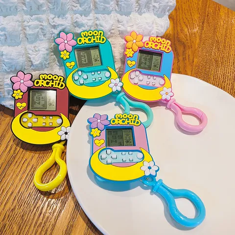 Lindo Llavero de Consola de Juegos de Mini Flor de Cerezo de Dibujos Animados de Plástico Creativo Colgante de Flor de Luna Juguete Electrónico Portátil Llavero Para Bolsa Alivio del Estrés Regalo