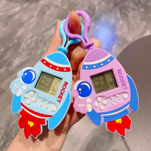 Niedliche Astronaut Rakete Handheld Spielkonsole Schlüsselanhänger Kunststoff Mini Elektronische Puzzle Gerät Schlüsselring Spielzeug Für Kinder Party Geschenk