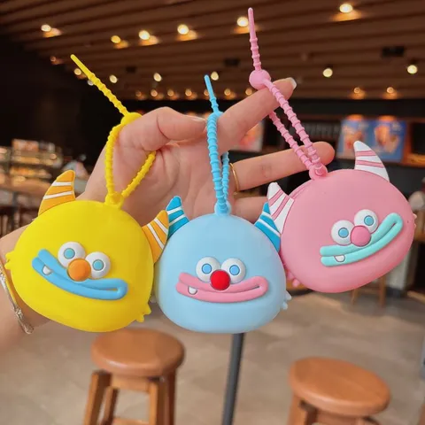 Weiches Süßes Cartoon Monster Silikon Münzbeutel Schlüsselanhänger Tragbare Kopfhörer Tasche Auto Schlüsselring Anhänger Geschenk