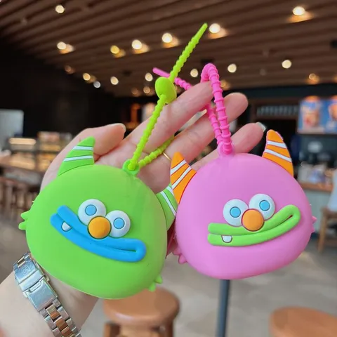 Weiches Süßes Cartoon Monster Silikon Münzbeutel Schlüsselanhänger Tragbare Kopfhörer Tasche Auto Schlüsselring Anhänger Geschenk