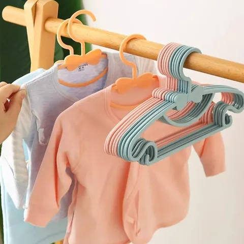 Kinder Kunststoff Kleiderbügel Süßes Schleifen Design Rutschfest Baby Kleiderbügel Haushalt Schrank Aufbewahrung