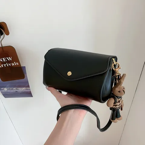 Γυναικεία Μόδα Δέρμα PU Κυλινδρική Τσάντα Crossbody Μονόχρωμη Casual Τσάντα Ώμου Με Χαριτωμένο Κρεμαστό