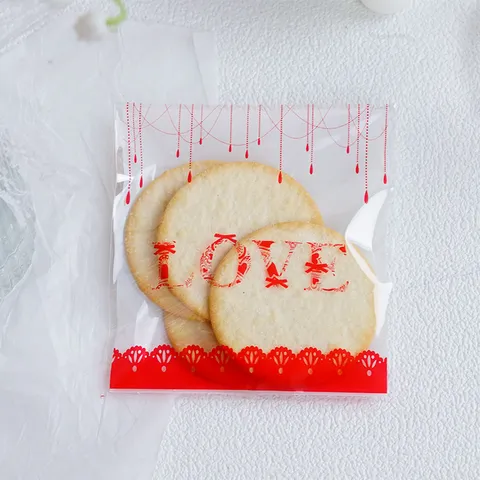 Romantic Plastic Transparent Self-Adhesive Food Packaging Bag Red Love Printed Lace Edge Cookie Biscuit Gift Bag For Bakery Valentines Day Holiday