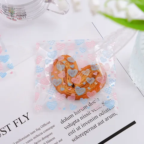 Transparente OPP Kunststoff Selbstklebende Herz Druck Cellophan Beutel Valentinstag Urlaub Geschenk Süßigkeiten Kekse Verpackung Beutel