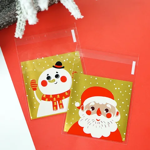 Christmas Cute Gold Santa Claus Snowman Print Self-Adhesive Packing Gift Bags Clear Plastic Candy Baking Treat Biscuit Storage Pouch Bags For Party Decoration Supplies