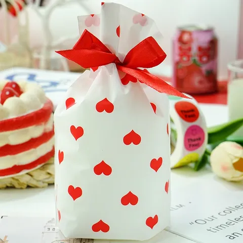 Romantisch Hart Bedruckt Kordelzug Verpackungsbeutel Plastic Snoep Cadeau Opbergzakje Met Lint Strik Voor Valentijnsdag Feest