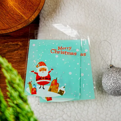 Festliche Weihnachten OPP Geschenktüten Cartoon Weihnachtsmann Lebkuchenmann Drucke Transparente Süßigkeiten Kekse Selbstklebende Verpackungsbeutel Für Feiertag Bäckerei
