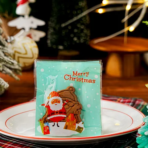 Festliche Weihnachten OPP Geschenktüten Cartoon Weihnachtsmann Lebkuchenmann Drucke Transparente Süßigkeiten Kekse Selbstklebende Verpackungsbeutel Für Feiertag Bäckerei