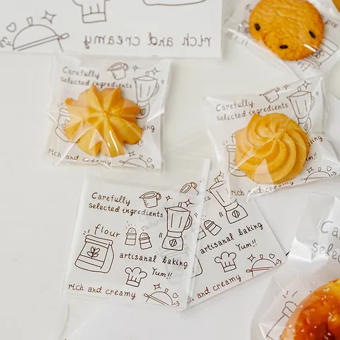Ins Style Transparent OPP Plastic Self Adhesive Cookie Packing Bag Carefully Selected Ingredients Cartoon Printed Self-Sealing Baking Treat Packaging Bag For Nougat Pastry Gift Biscuits Homemade Bakery